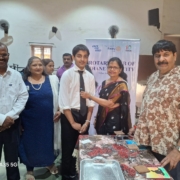 Leadership in Action The Principal and Rotary Club dignitaries confer the responsibilities upon the new Interact Club leaders.
