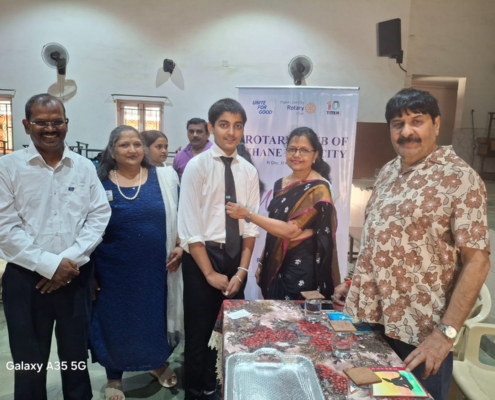 Leadership in Action The Principal and Rotary Club dignitaries confer the responsibilities upon the new Interact Club leaders.